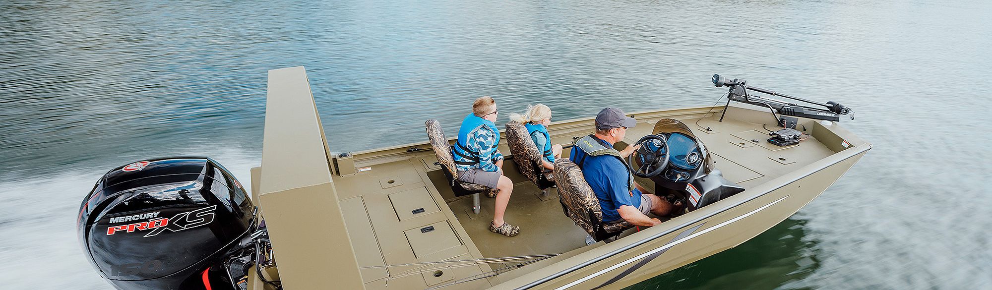Fisherman Driving Lowe Outlet Mod V Fishing Boat with Son and Daughter, Starboard View